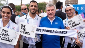 Olympic athletes call for peace from the Olympic Village